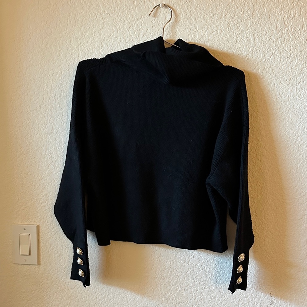 Elegant Black Knit with Gold Button Details